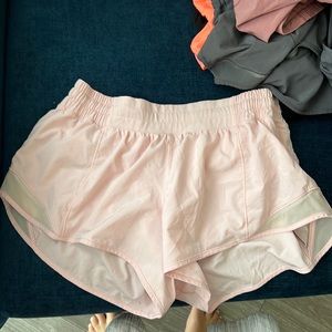 Lululemon pink shorts. Size six. With zipper on side.